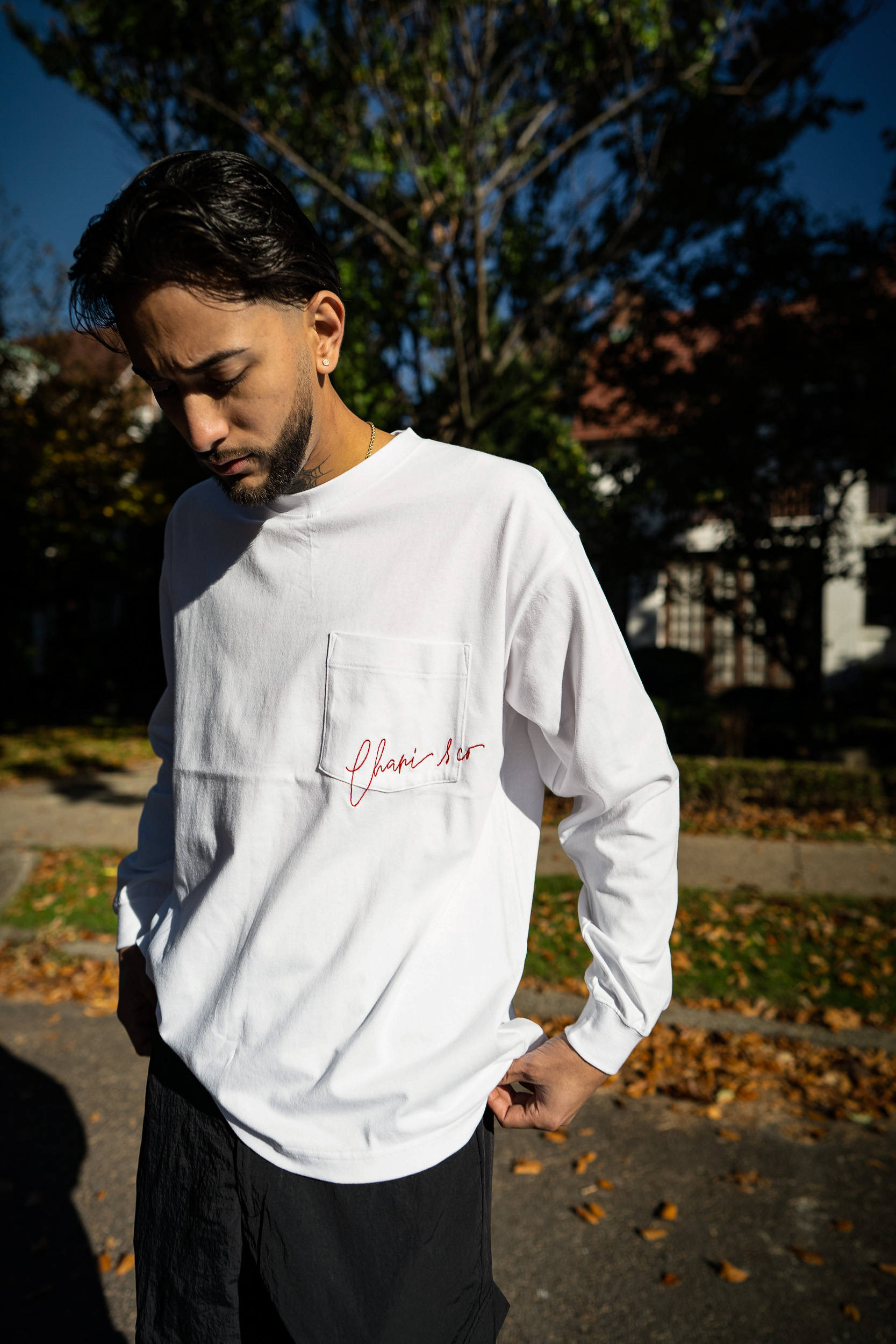 EMBROIDERY SCRIPT ON PKT L/S TEE